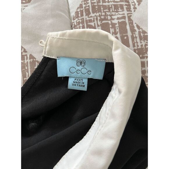 CECE Women's Short Sleeve Color Blocked Collared Blouse Black and White - Picture 2 of 12